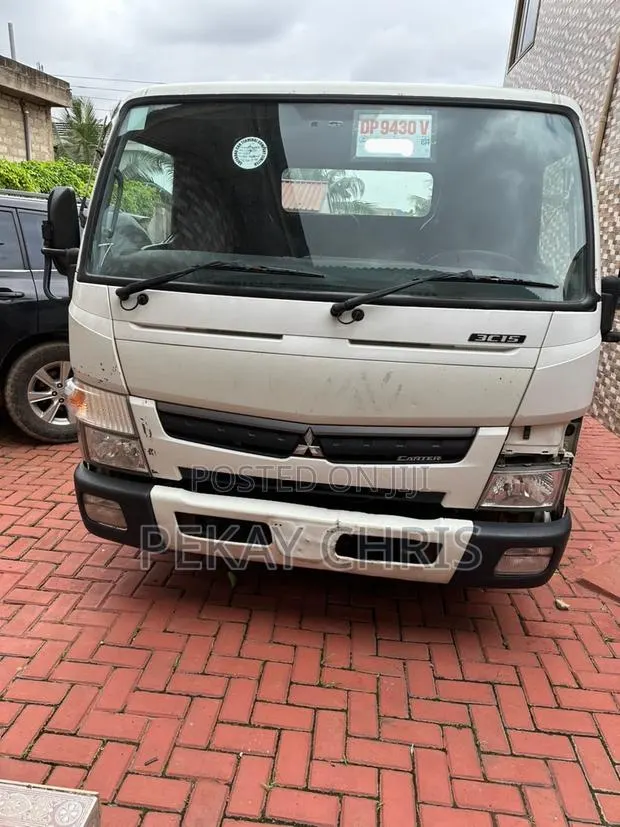 Mitsubishi Fuso Canter 3C15 Flatbed Truck (UK Used) · Photo 1