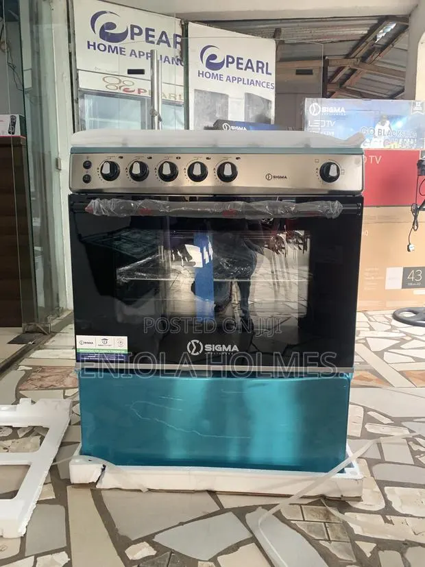 80 by 60 5 Burner Gas -Oven Cooker · Photo 1
