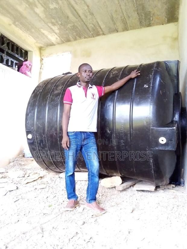 Borehole Drilling Services With Quality Pump and Blue Pipes · Photo 6