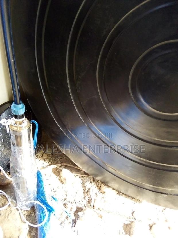 Borehole Drilling Services With Quality Pump and Blue Pipes · Photo 4