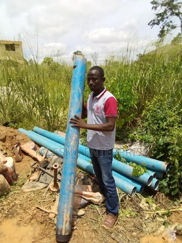 Borehole Drilling Services With Quality Pump and Blue Pipes · Photo 5