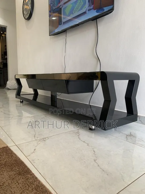 Slight Used TV Stand · Photo 1