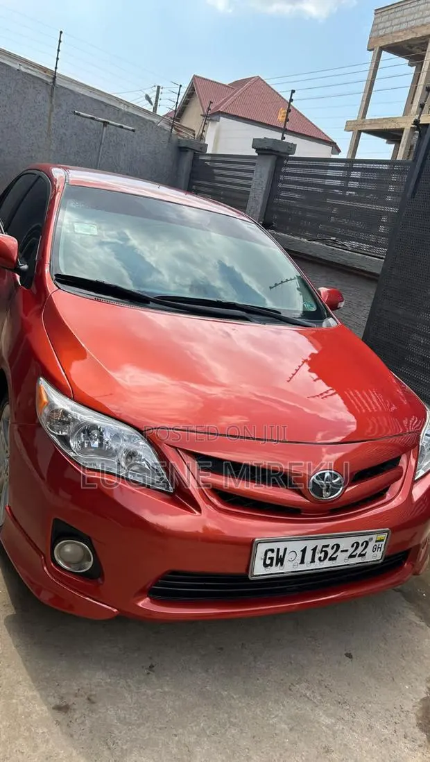 Toyota Corolla 2013 Orange · Photo 1