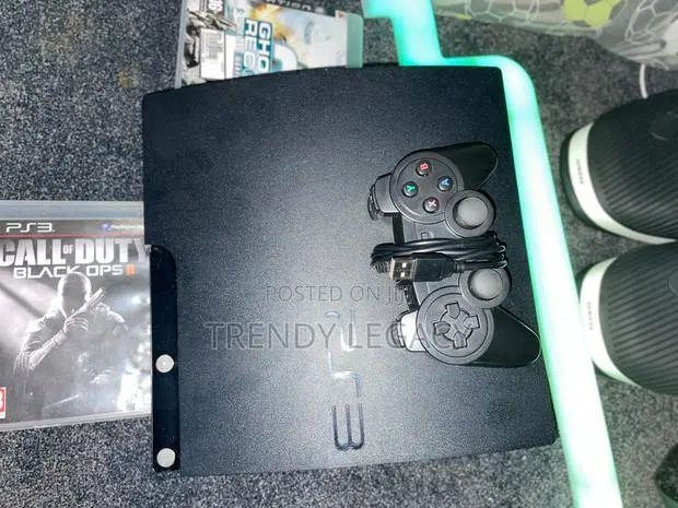 PlayStation 3 SLIM · Photo 1
