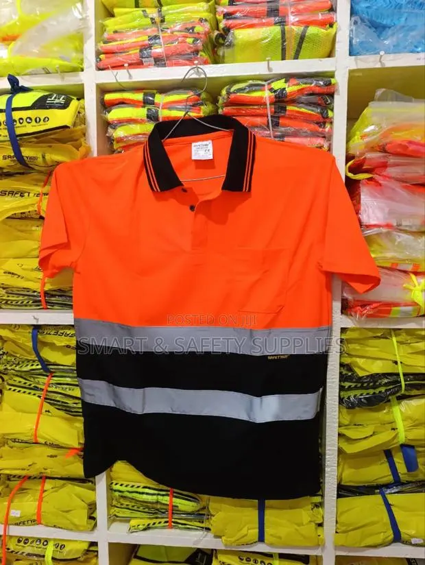 Orange (Safety Boy ) Lacoste Reflective · Photo 1