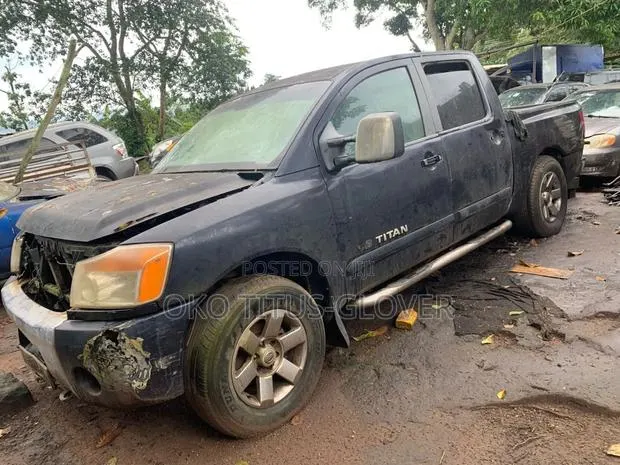 Nissan Titan Crew Cab SE 4x4 2010 Blue · Photo 1