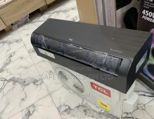 Ultra. New TCL 1.5 Hp Inverter Air Conditioner Dark Gray/Black Mirror · Photo 1