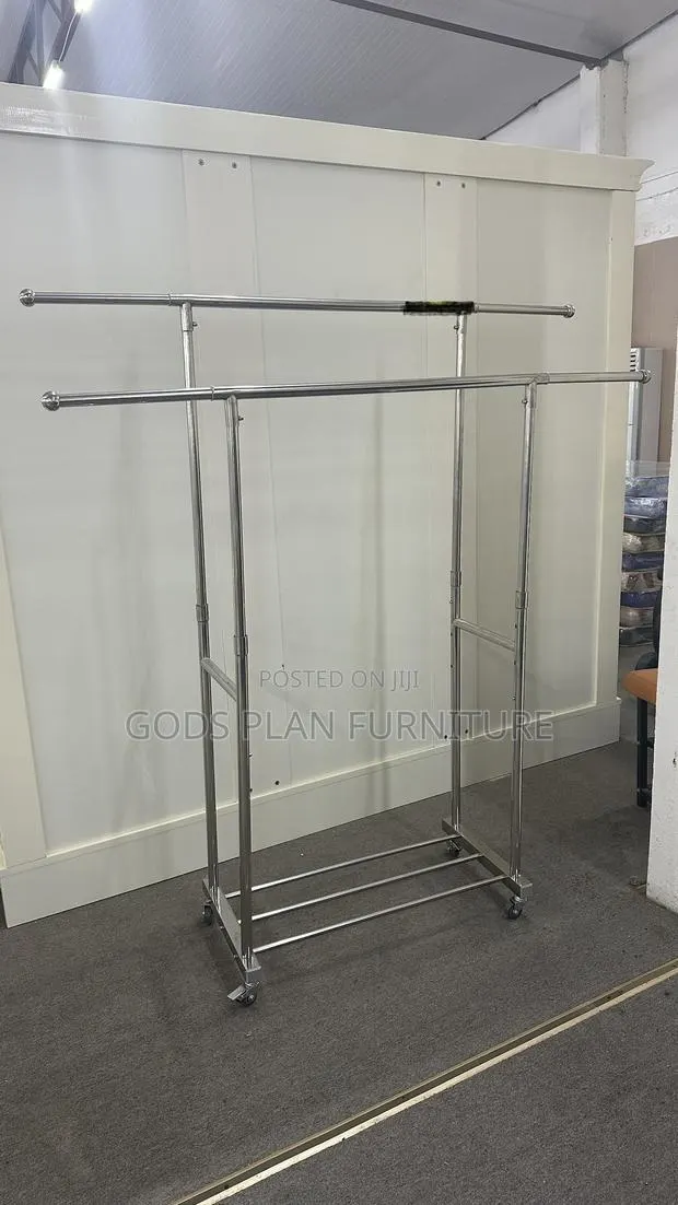Double Rod-Adjustable Rolling Garment Rack · Photo 1