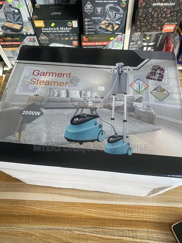 Easy to Use Turquoise Garment Steamer for Home and Business · Photo 1