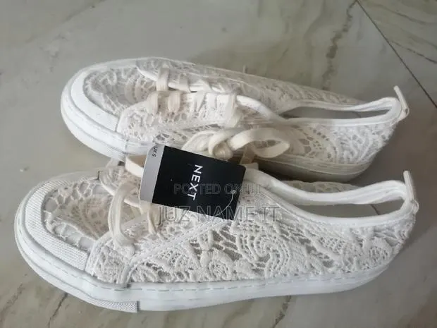 Next Sneakers · Photo 1