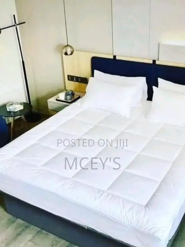 Quality King Size Mattress Topper in White · Photo 1