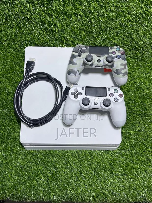 Sony Ps4 Slim With Fc27 and Other 10 Games and 2 Controllers · Photo 1