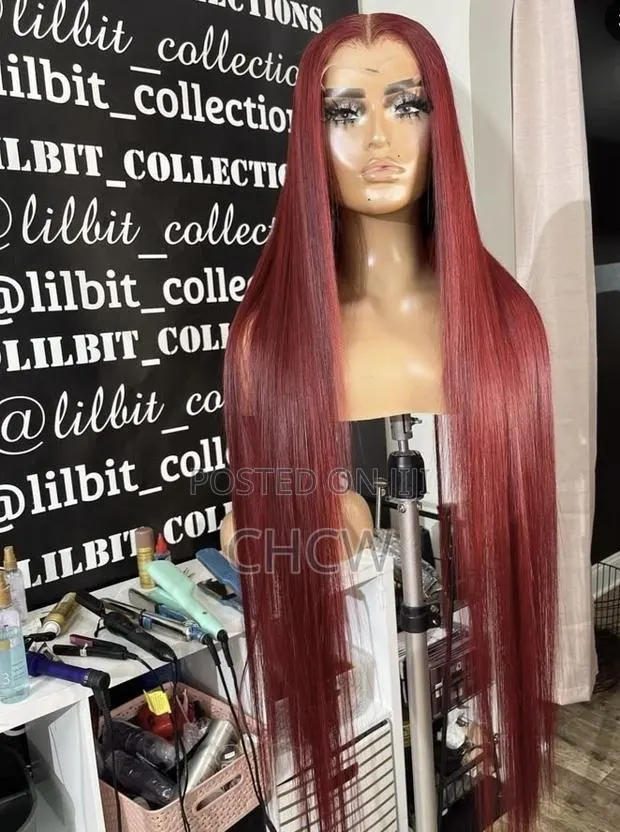 Slicky New 30 Inches Long Sleek Burgundy Wig With a Kim K Closure · Photo 1