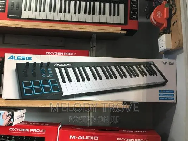 Alesis V49 USB Midi Keyboard Controller W/ 8 Beat Pads · Photo 1