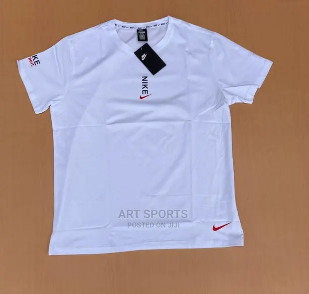 Nike Tops . · Photo 1
