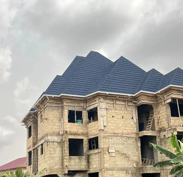 Quality Stone Coated 50 Years Guarantee , Strong Roof, Lasting Value. · Photo 1