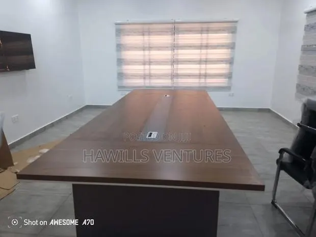 Executive Conference Table Designed to Suit 16 Number of People · Photo 1