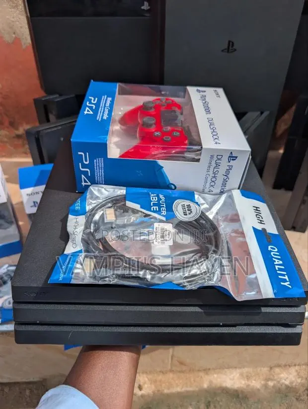 PS4 Pro 1TB With 13 Games and All Accessories · Photo 1