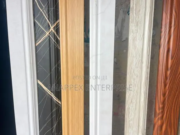 Skirtings for the Edges of Tiles and T G Ceiling. · Photo 1