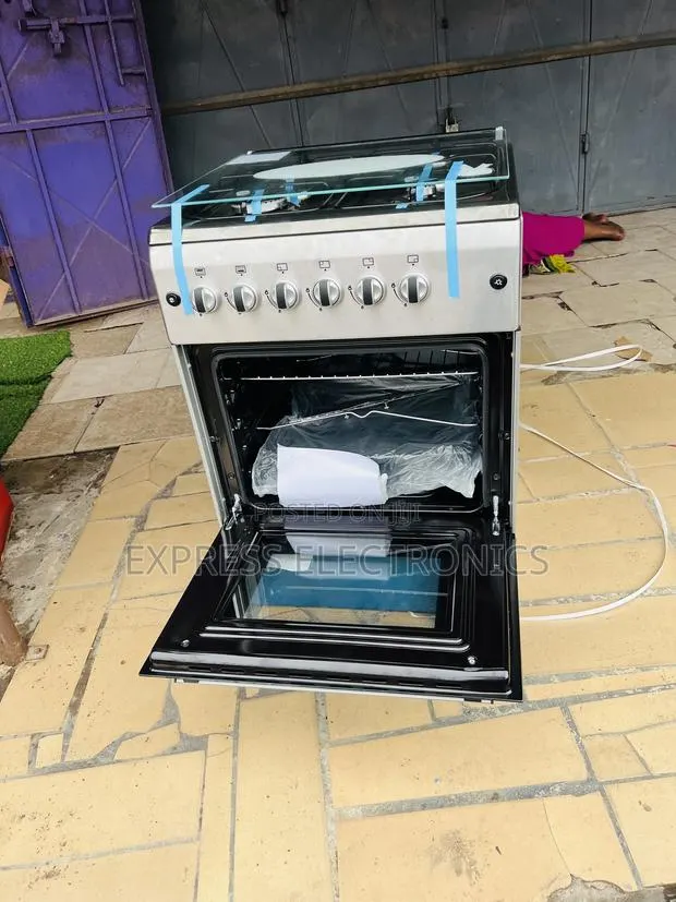 Ultra Sleek Gas Cooker New Line 4burner 60/60 Rotisserie · Photo 1