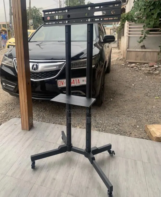 Purchase Mobile Tv Stand With Wheels for 32”-70 Inch Tv. · Photo 1