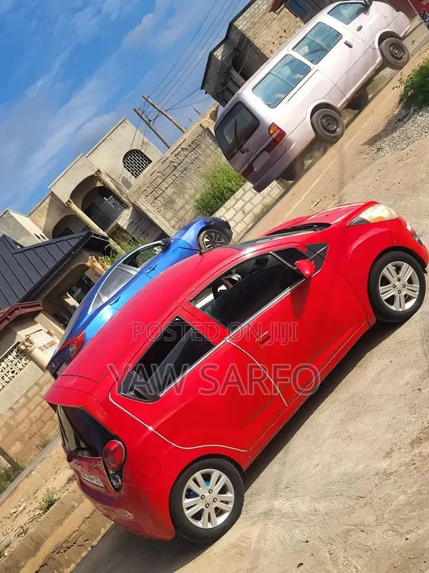 Chevrolet Spark 2014 Red · Photo 1