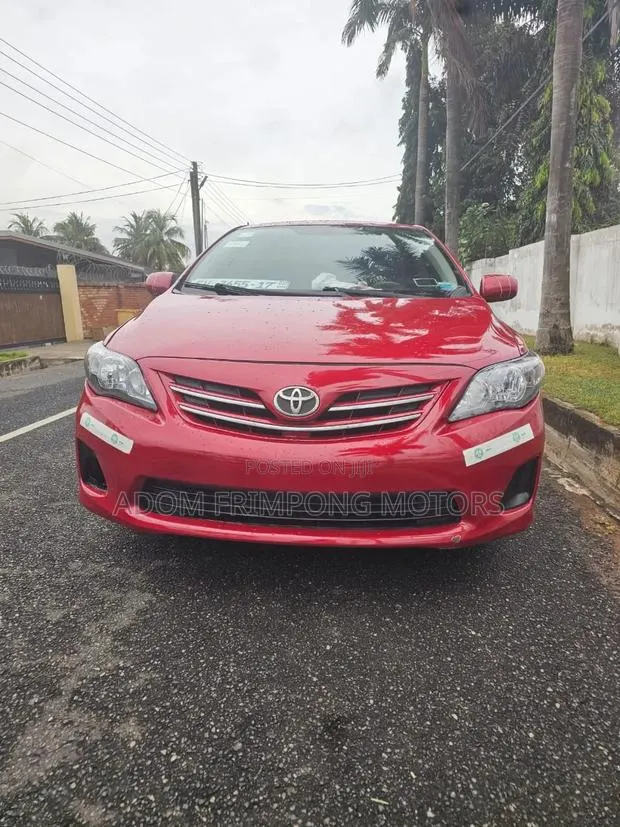Toyota Corolla LE 4dr Sedan (1.8L 4cyl 4A) 2013 Red · Photo 1