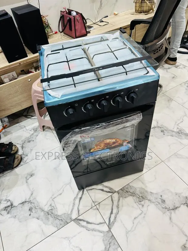 Midea Best Gas Cooker Oven Grill 50/50 4b · Photo 1