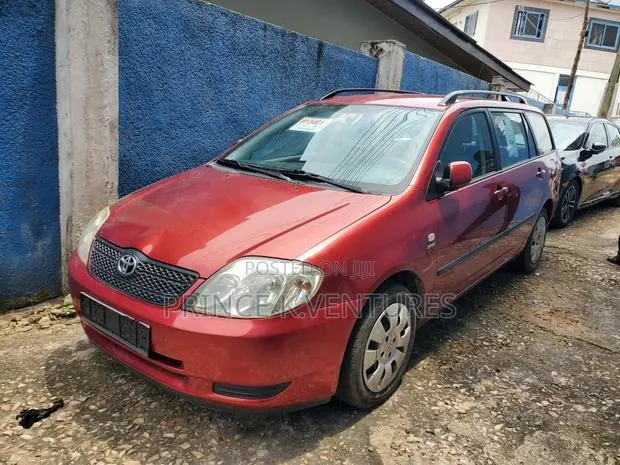 Toyota Corolla 2004 Red · Photo 1