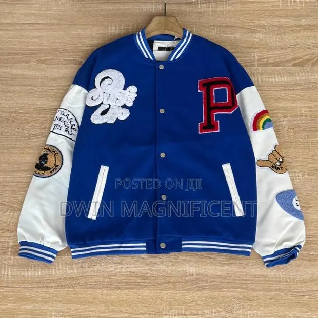 Patch-Embroidered Varsity Jacket. · Photo 1