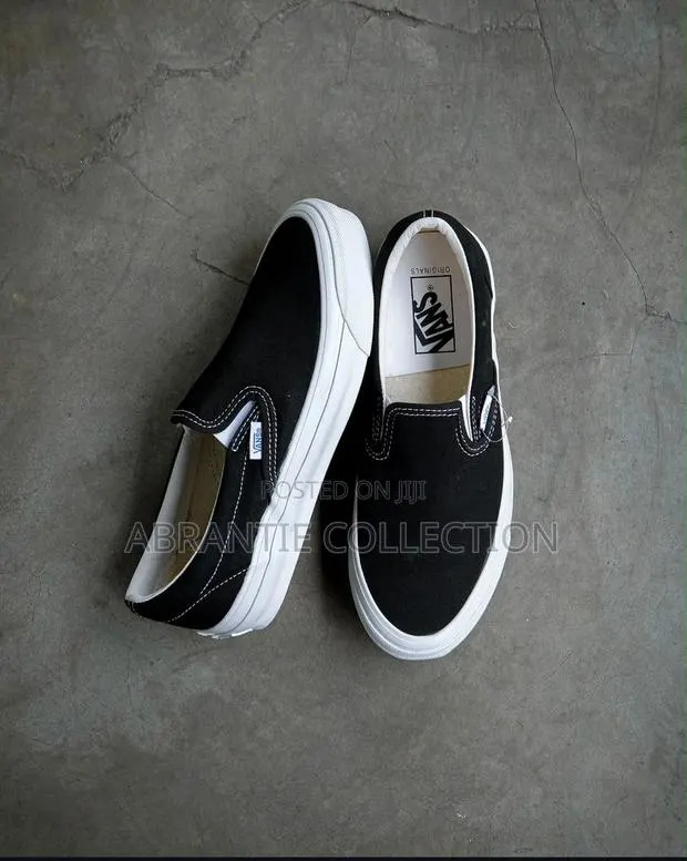 The Vans Premium Slip on Black/White · Photo 1