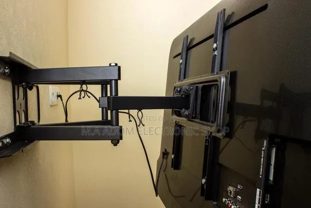 Ultra Durable Double Arm Adjustable Tv Wall Mount · Photo 1