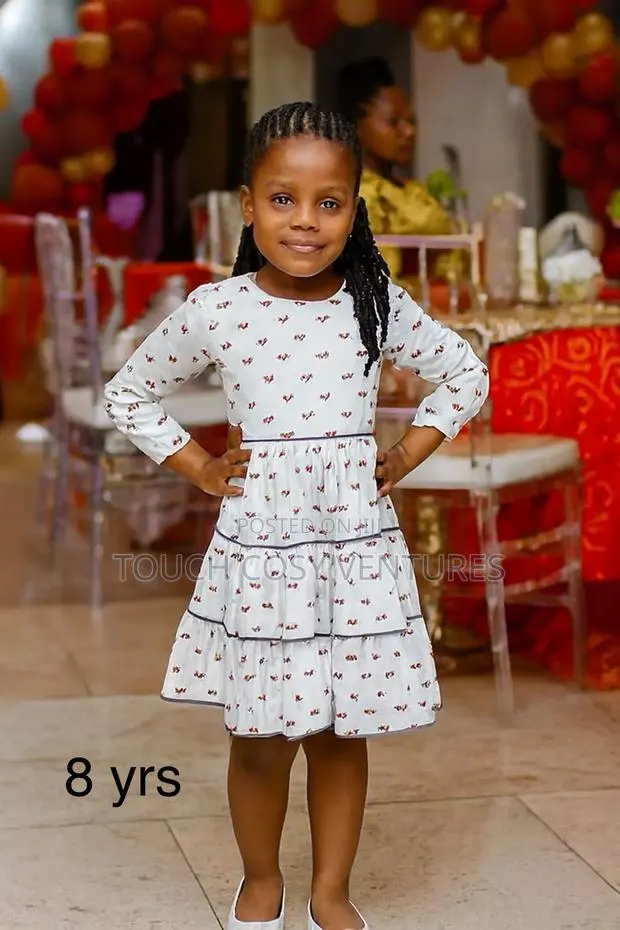 “White Tiered Floral Party Dress (8 Yrs) · Photo 1