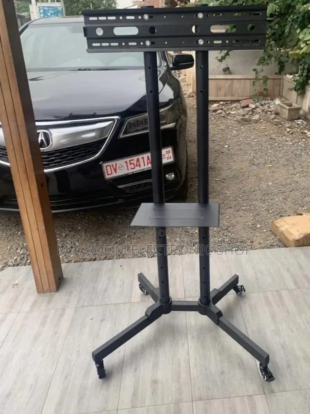 Mobile Tv Stand With Wheels for 32 Inch to 70” Television. · Photo 1
