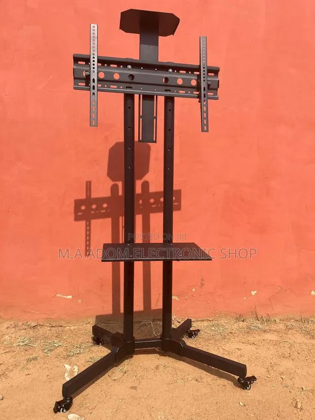 Mobile Tv Stand With Adjustable Wheels 32”-70” · Photo 1