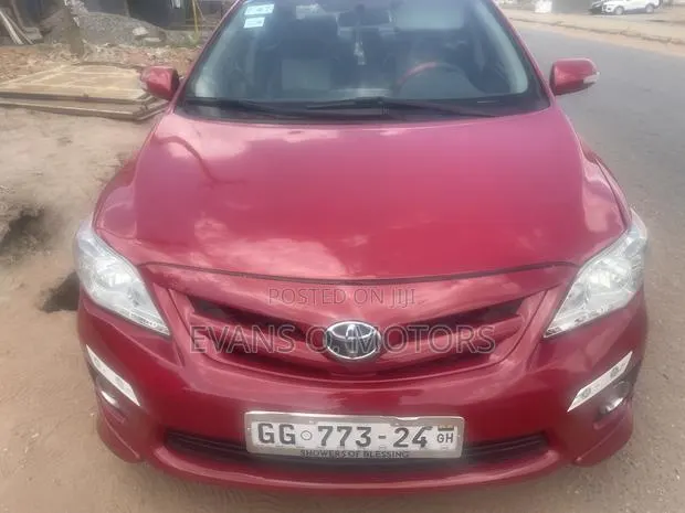 Toyota Corolla Base 4dr Sedan (1.8L 4cyl 5M) 2010 Red · Photo 1