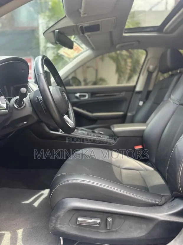 Honda Civic Touring CVT 2023 Black · Photo 1