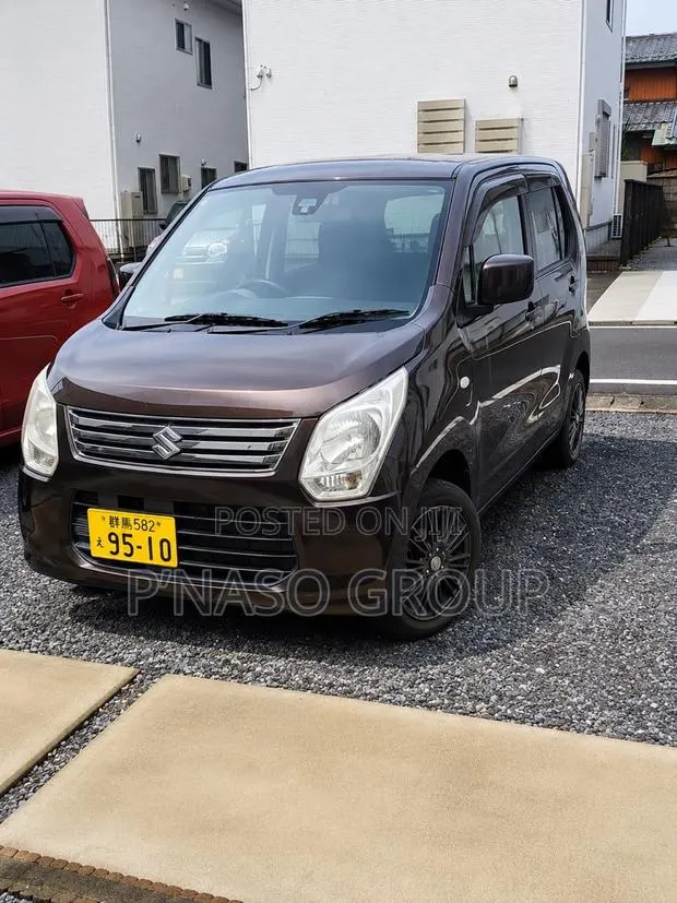 Suzuki Wagon R 660 Petrol FWD 2013 Brown · Photo 1