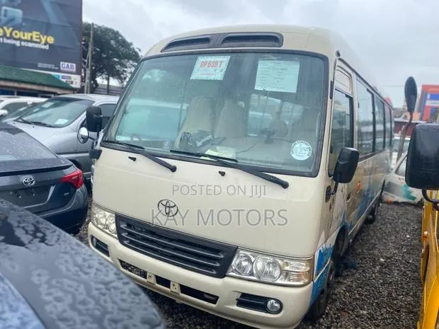 Toyota Coaster 2015 Grey · Photo 1