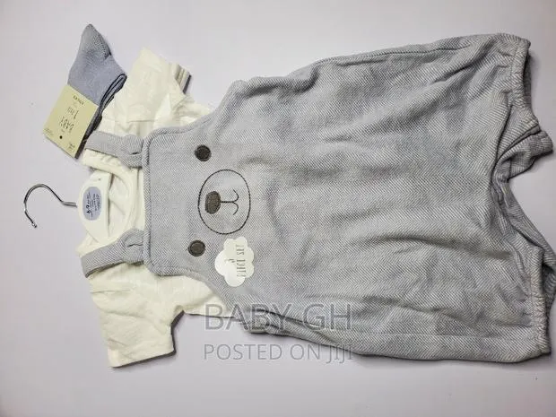 Goerge Baby Brace Jumper and White Top With a Pair of Socks · Photo 1