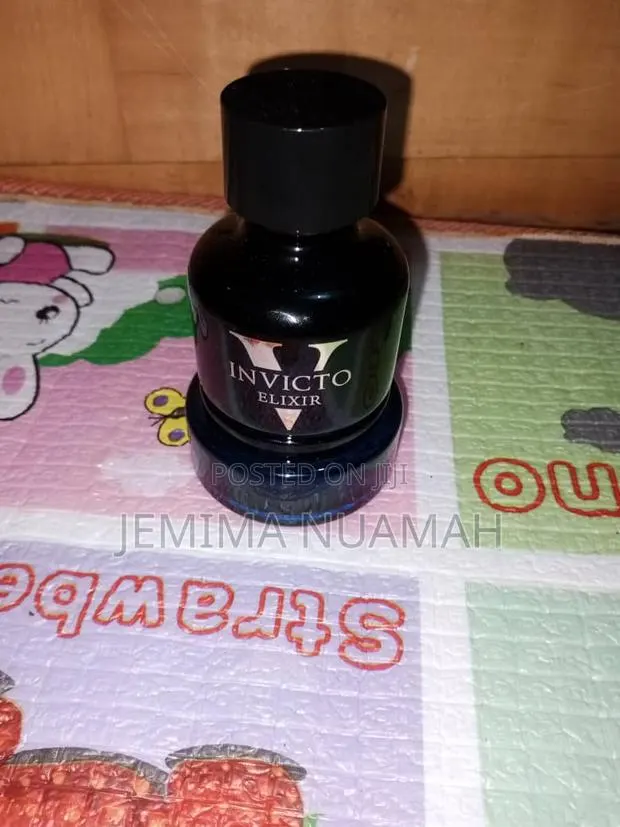 Invicto Victorious Elixir Perfume · Photo 1