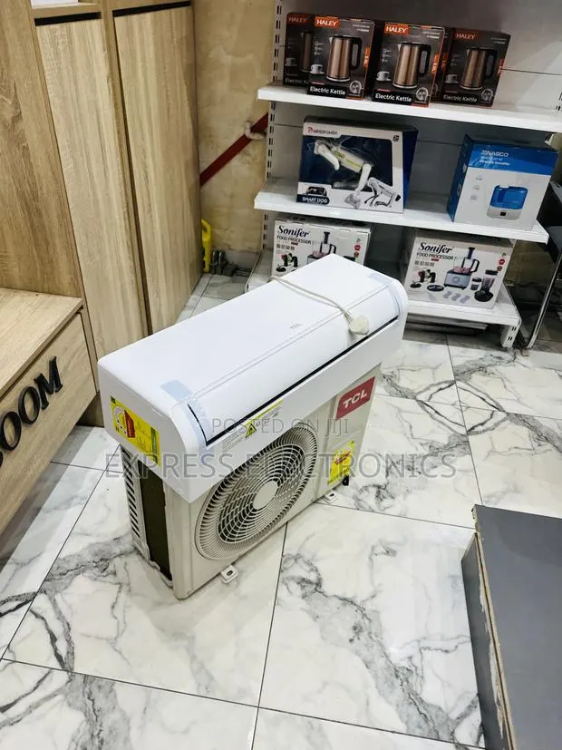 Ultra Modern Sleek White 1.5hp Split R410 Gas TCL · Photo 1