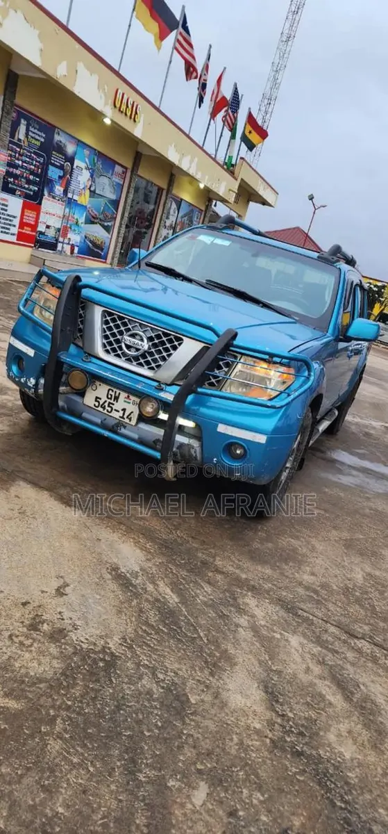 Nissan Frontier 2010 Blue · Photo 1