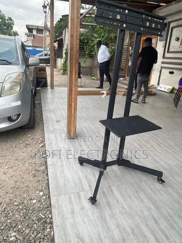 Glamorous Heavy-duty Trolley Tv Stand: Style Meets Portability · Photo 1