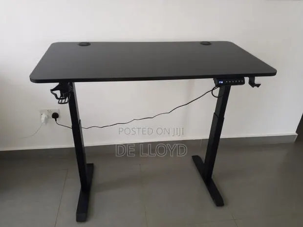 Aor 140 by 60 Electric Adjustable Table · Photo 1
