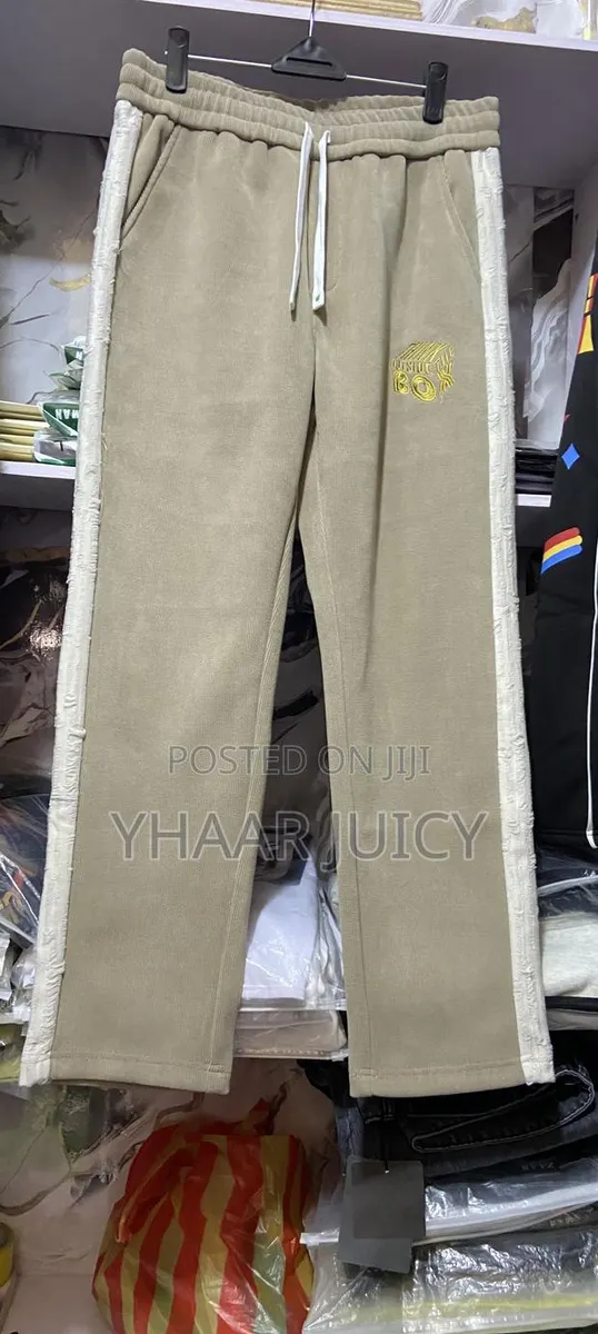 Light Brown Jogger With a White Design at the Side · Photo 1