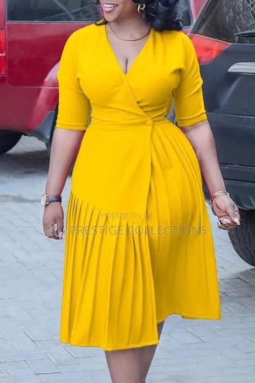Yellow Pleated Wrap Flare Midi Dress · Photo 1