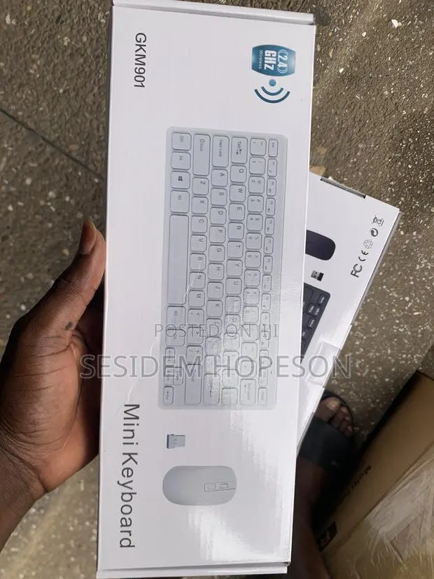 2.4GHz Wireless Ultra-Thin Mini Keyboard and Mouse Combo Pack · Photo 1