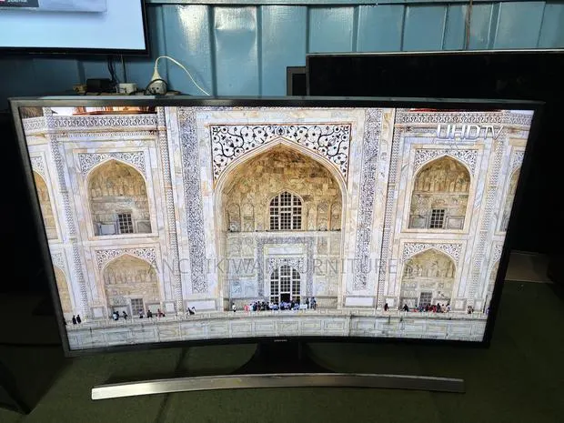 Samsung Curved 40 Inch Smart Uhd,Digital Satellite,Netflix,Youtube · Photo 1