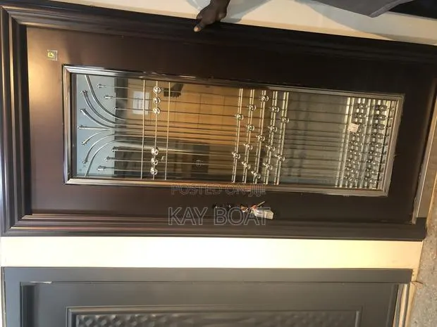 A Security Door With a Tempered Glass · Photo 1
